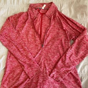 Red women’s under armor pull over
